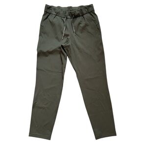 Lululemon On the Fly 7/8 Pant Dark Olive SZ 4